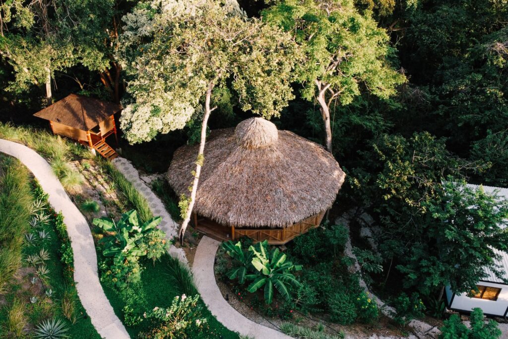 Aerial view of the Retreat Maloca surrounded by Costa Rican jungle.