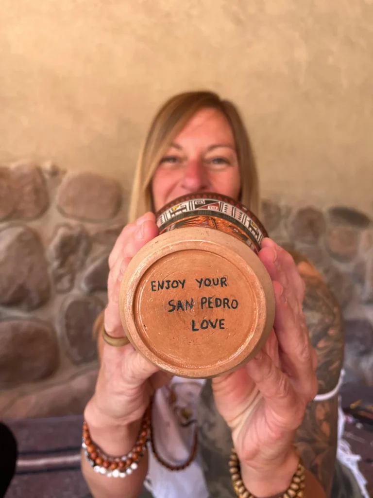 Glass containing San Pedro brew, prepared for sacred ceremony as part of a transformative Huachuma experience