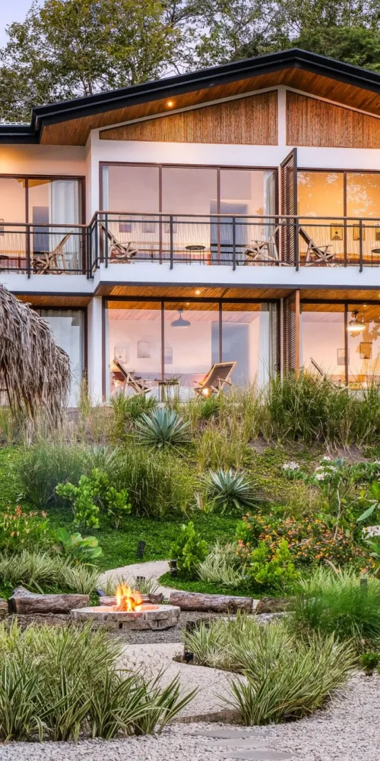 Ananda Lodge's main building that hosts ayahuasca retreat Costa Rica is nestled in a lush natural setting.