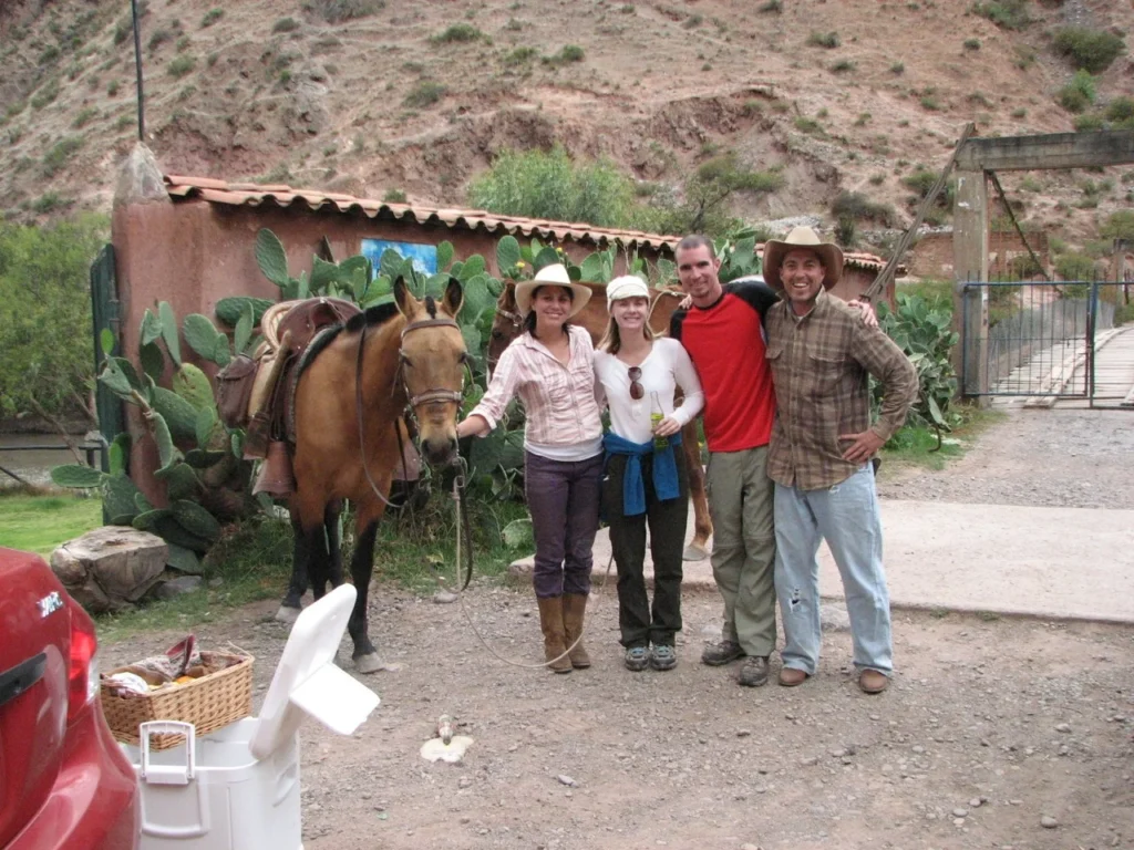 Couple hiking near ancient ruins in Peru before beginning an ayahuasca journey, a prelude to powerful ayahuasca experience stories