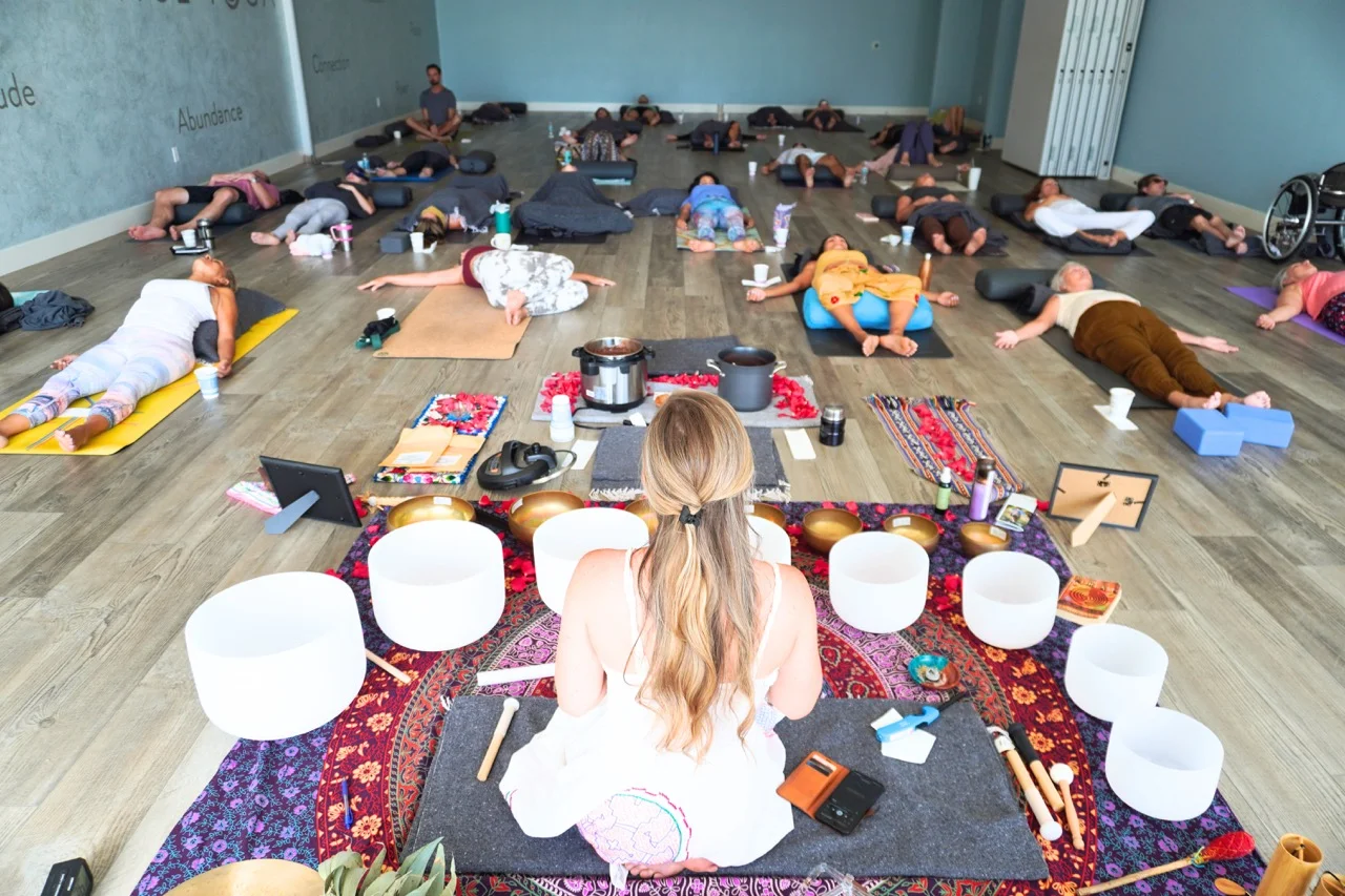 Woman practicing after her retreat, completing her ayahuasca experience story with reflection and gratitude